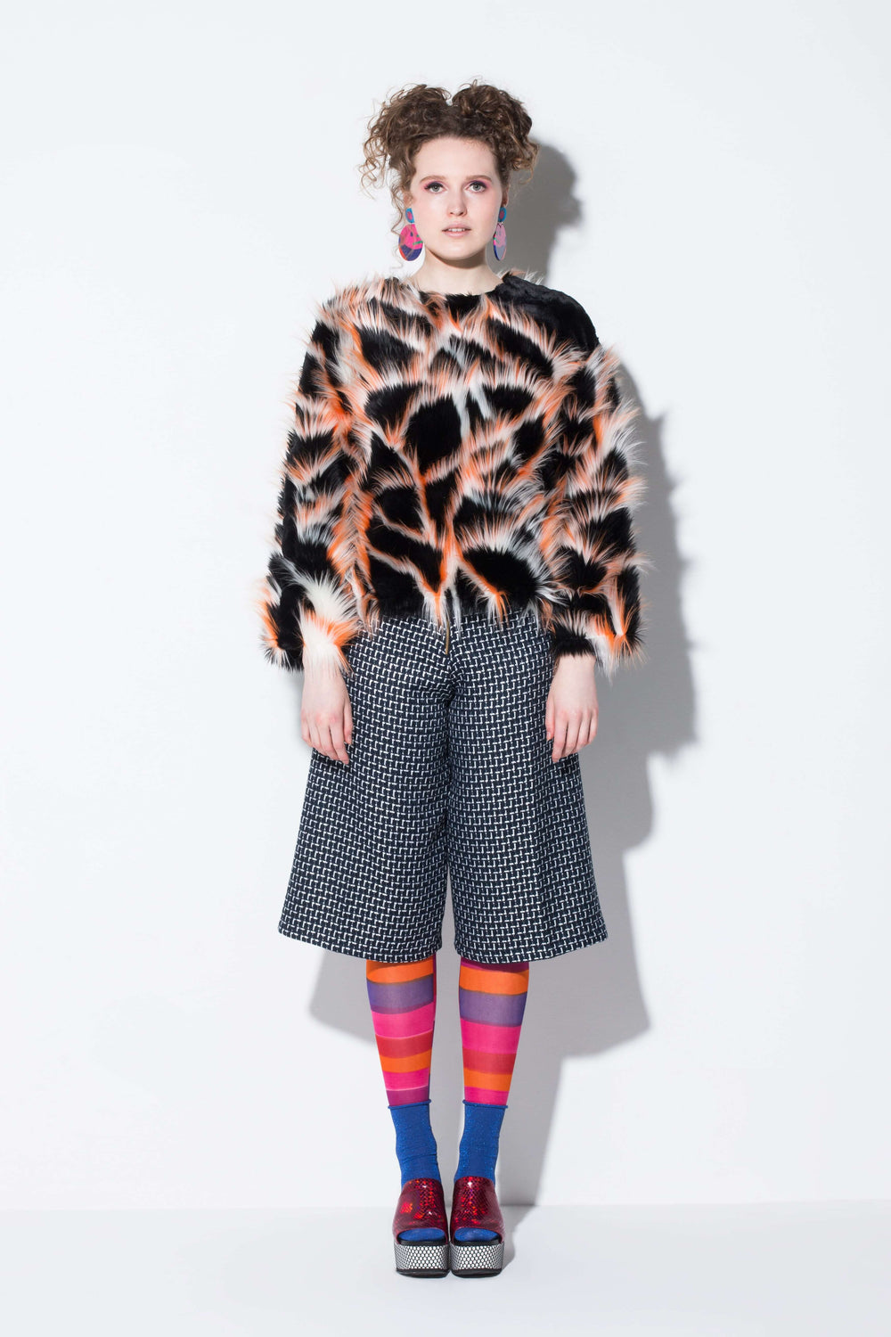 free spirit| a fun faux fur top in flash orange and black colour block from jin & yin front view