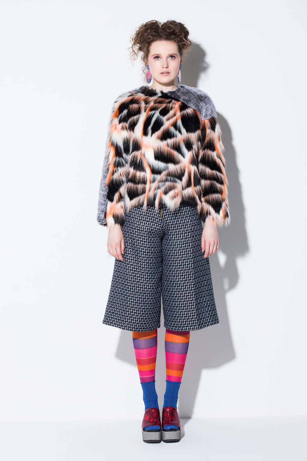 free spirit| a fun faux fur top in flash orange and grey colour block from jin & yin front view